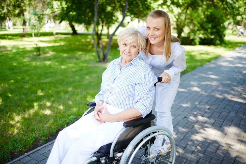 A support worker assisting a wheelchair user