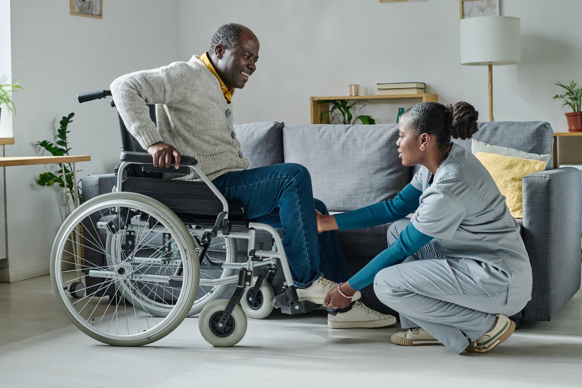 Support worker assisting a wheelchair user