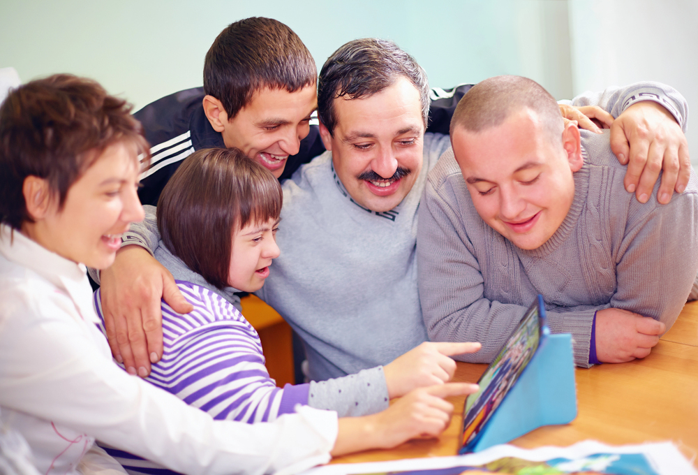 People enjoying time together with disability support